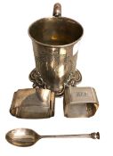 A collection of sterling silver items to include a christening mug napkin rings etc. Various dates