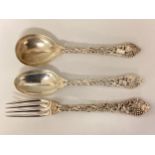 A set of three items of sterling silver cutlery. Plain bowls with cast leaf and vine stems. CJ