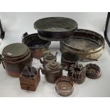 A collection of metalware, copper and brass items.