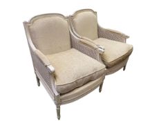A very good pair of chairs, with double bergere caning to the sides. in good condition