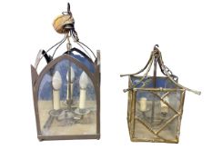Two glass and metal hanging ceiling lanterns, tallest overall 51cm H