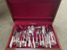 A silver plated dining service. 12 person Community pattern by Oneida, in fitted mahogany box.