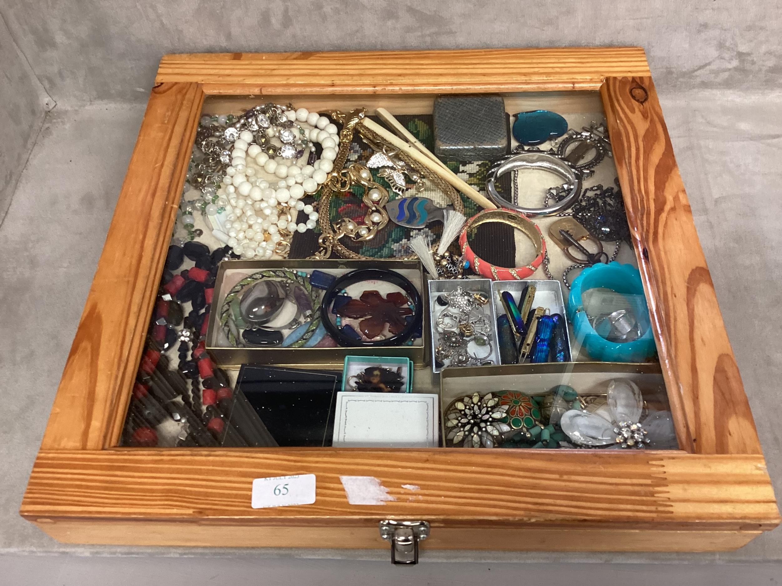 A collection of costume jewellery to include Scottish agate items contained within a glass topped - Image 2 of 6