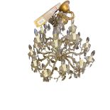 A large, multi branch Chandelier, and a smaller brass multi branch chandlelier