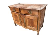 A C19th rustic fruitwood sideboard, with 2 short drawers over two cupboard doors, with split to top,