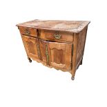 A C19th rustic fruitwood sideboard, with 2 short drawers over two cupboard doors, with split to top,