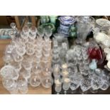 A large collection of 20th century glassware decanters , vases etc.