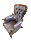 A Gents Victorian fireside chair, in blue/grey buttoned leather