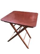 A small pair of folding campaign style tables with square tops, 40cm x 35cm top, and 51.5cmH