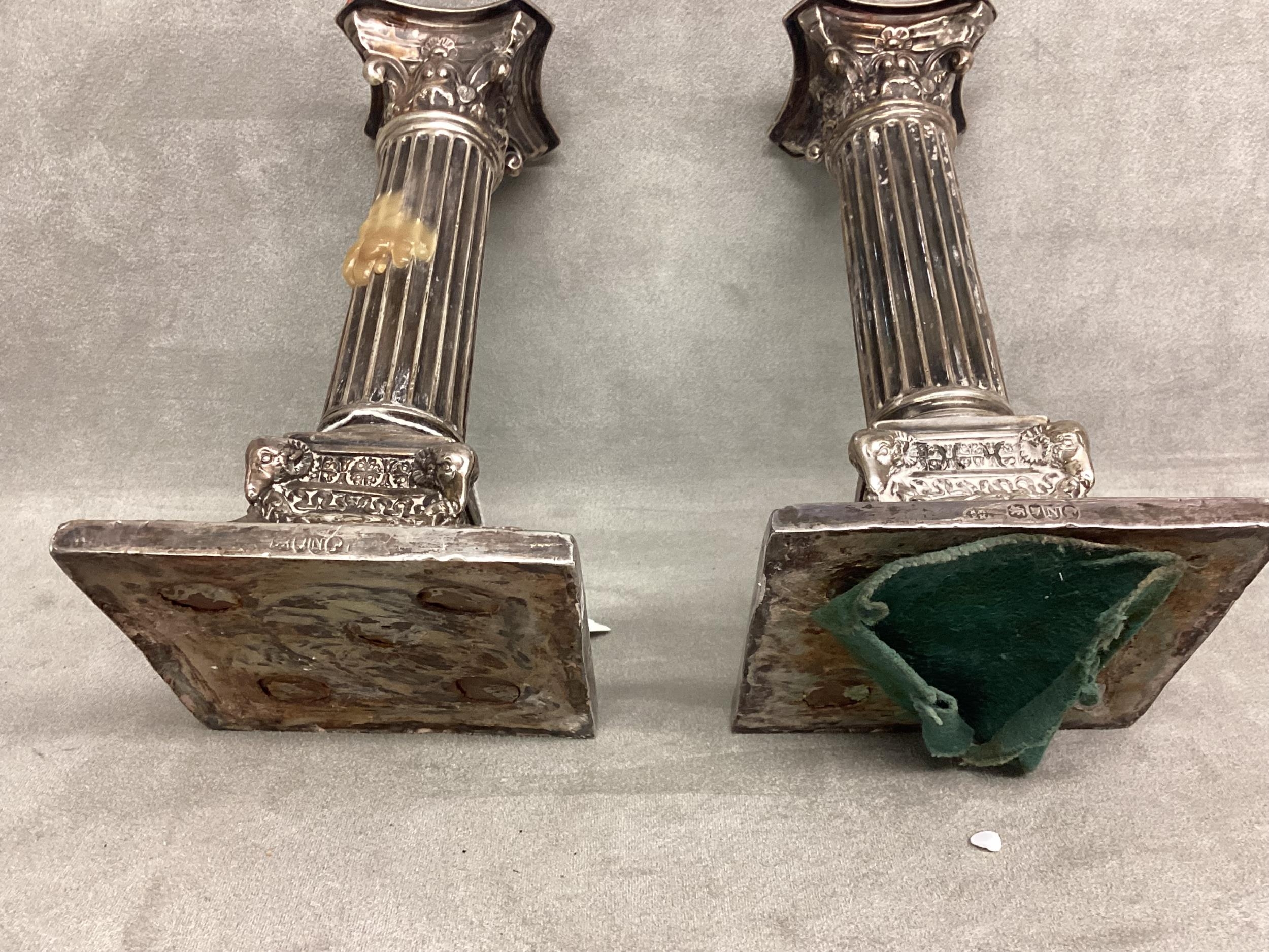 A pair of sterling silver candlesticks, columns and swag decoration on square base by Martin Hall - Image 4 of 4