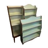 Three similar wooden waterfall bookcases, with painted interior, tallest is 136cmH x 62cmW, some