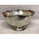 A sterling silver bowl with scalloped edge on circular stepped foot. Hamilton and Co London 1908 .