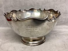 A sterling silver bowl with scalloped edge on circular stepped foot. Hamilton and Co London 1908 .