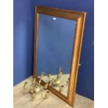 A gilt framed wall mirror, overall measures 80cmW x 103 Lcm
