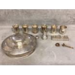 A collection of miscellaneous sterling silver items to include an ice bucket lid, 5 shot beakers