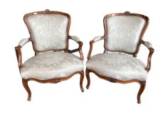 Pair of modern fauteuils, with walnut frame and duck egg blue silk upholstery