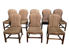 A set of 8 mahogany brass studded dining chairs, with splayed back legs, in need of some