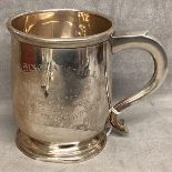 A sterling silver mug. By Atkins Bros Ltd. Birmingham. 1954. 234g. 11cm(h)