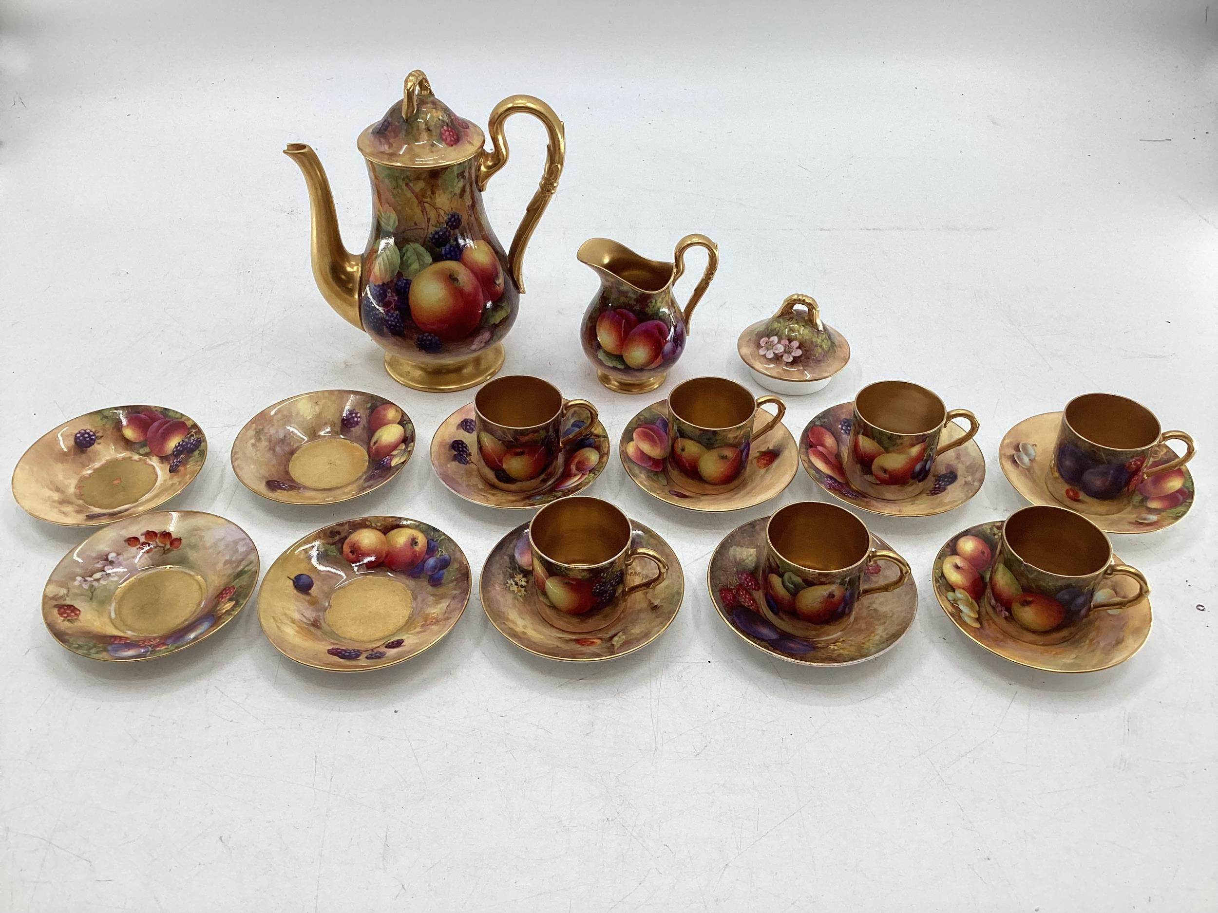 A Royal Worcester part Coffee Service, painted fruits and fauna, to include milk jug, Coffee Pot,