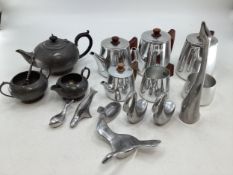 A stainless steel Picquot ware tea set together with stainless steel ornaments and a pewter tea pot
