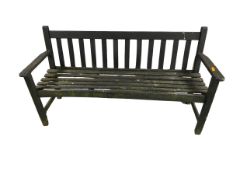 Black painted wooden three seater straight back garden bench, some wear and losses, but