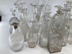 A collection of 19th/20th century glassware to include decanters , jugs vases etc.