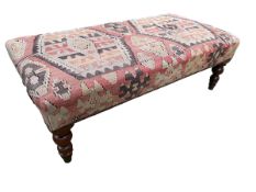 A kilim covered foot stool raised on mahogany turned legs to brass cups and a quantity of other