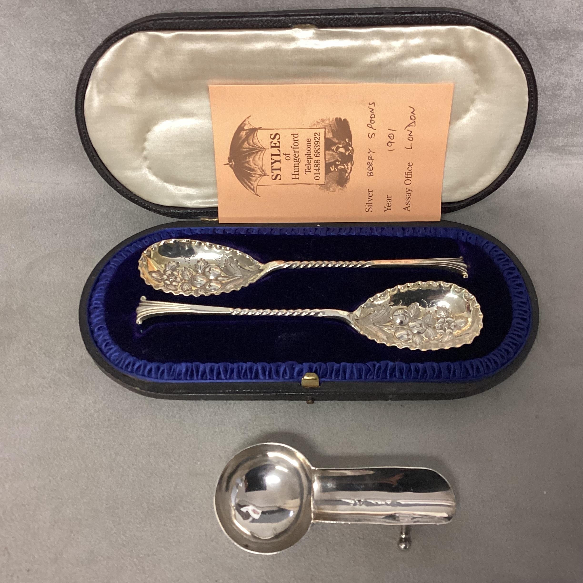 A Sterling silver pen rest together with a boxed pair of Strawberry spoons. Various dates and