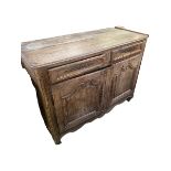 A C19th French oak rustic sideboard, with 2 short drawers over two cupboard doors, with much wear