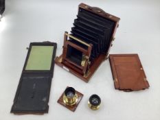 A mahogany and brass collapsible concertina field camera with two lenses by WB Whittingham & Co