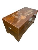 An Oriental camphor wood chest with brass fittings and carved coastal scene, 101 x 50d x 55cmH