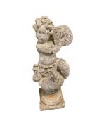 A weathered garden ornament, of a cherub on ball finial
