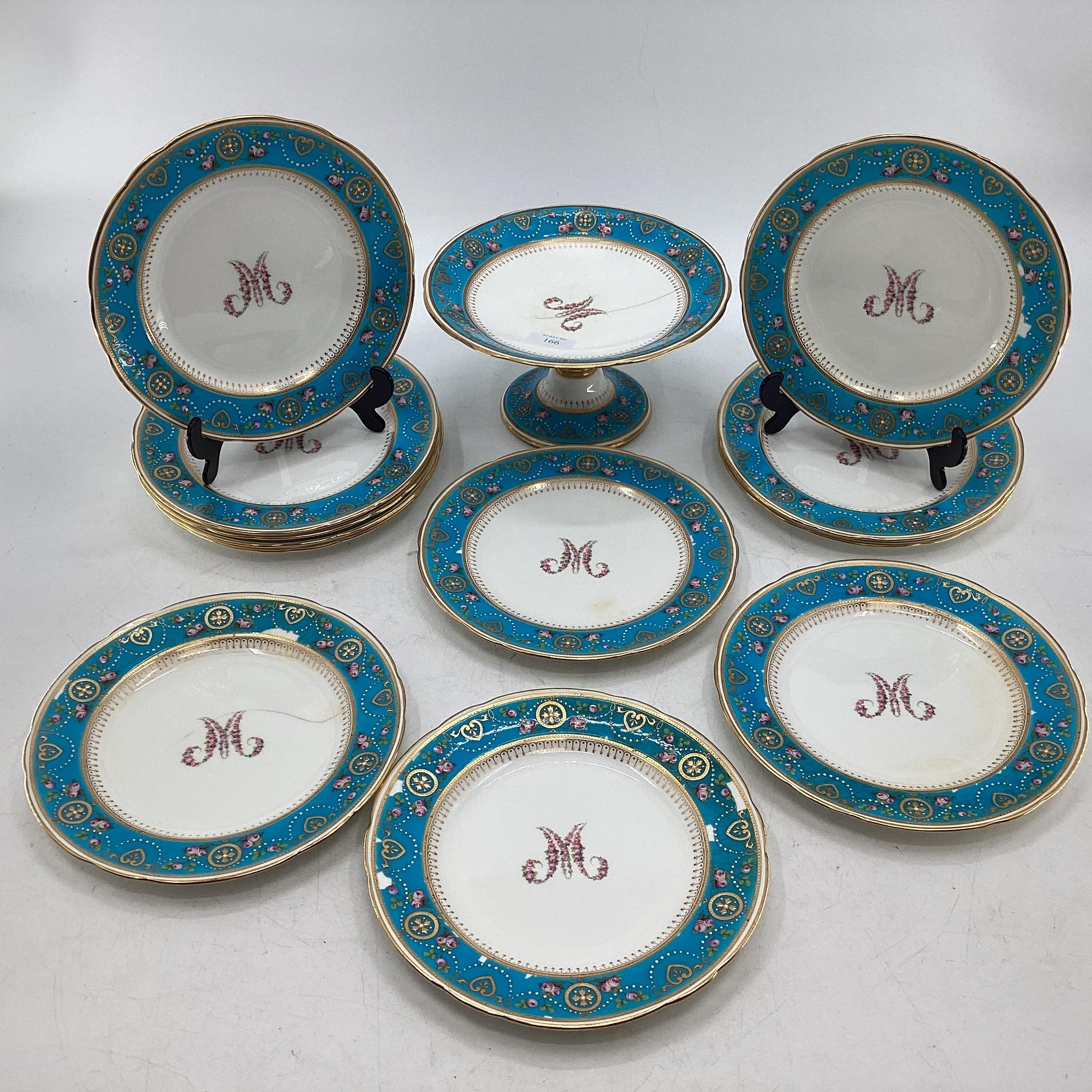 A Minton jewel ware part dining service, Taza(AF) and twelve plates. Retailed by Thomas Goode and Co