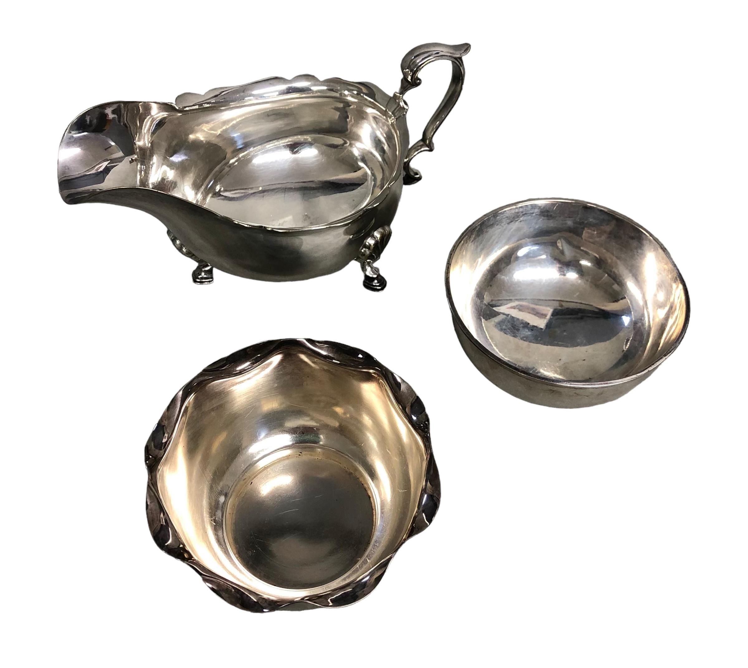 A sterling silver circular bowl. By Stokes and Ireland Ltd Chester, 1902 115g with two plated items.