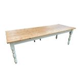 A kitchen table, with pine top and cream painted base, 244cm Long, and 91cm wide, and overall height