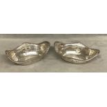 A pair of sterling silver pierced dishes of oval form. Charles S Green and Co, Birmingham. 1910.