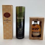 Three bottles of boxed single malt whisky. The Glenrothes 43% Vol 70cl, Glenlivet 12 years 43% Vol