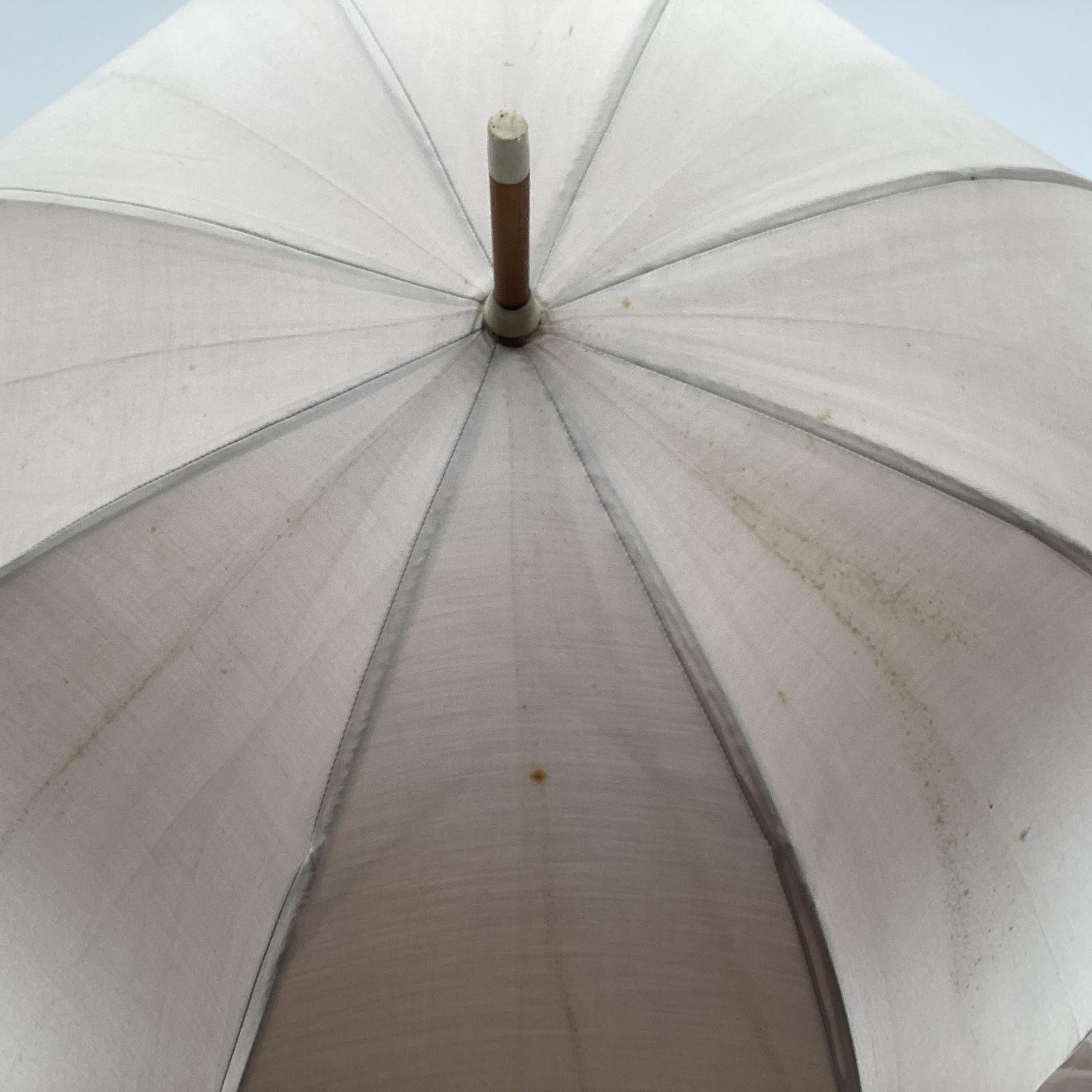 A parasol with bamboo shaft and silk cover, with hallmarked silver collar; and a cream silk - Image 16 of 16