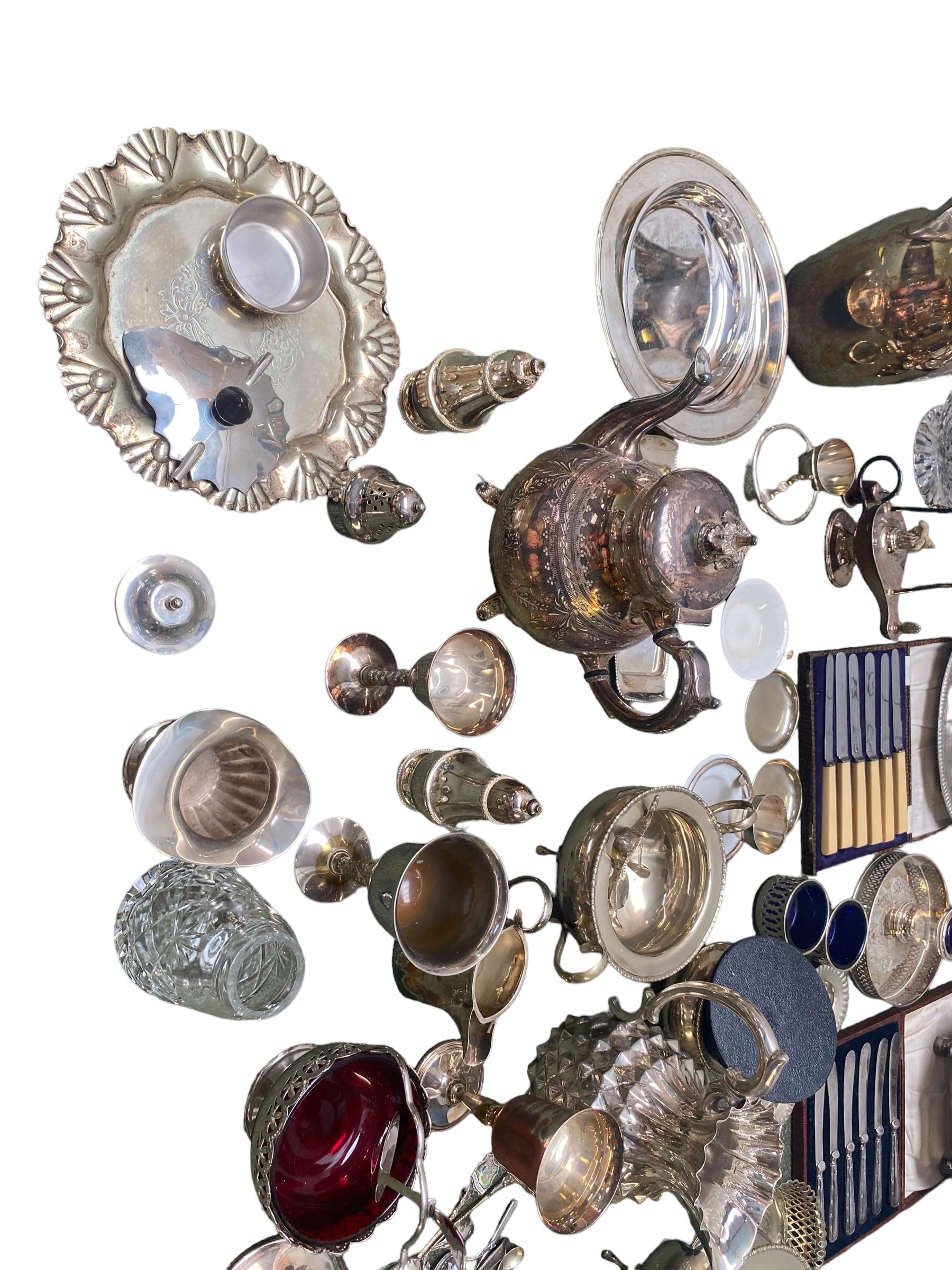 A large collection of silver plated wares.