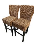 Pair of modern rattan style high backed bar stools