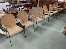 A good set of 8 Conran wicker kitchen/conservatory arm chairs, with wrought iron style frames and