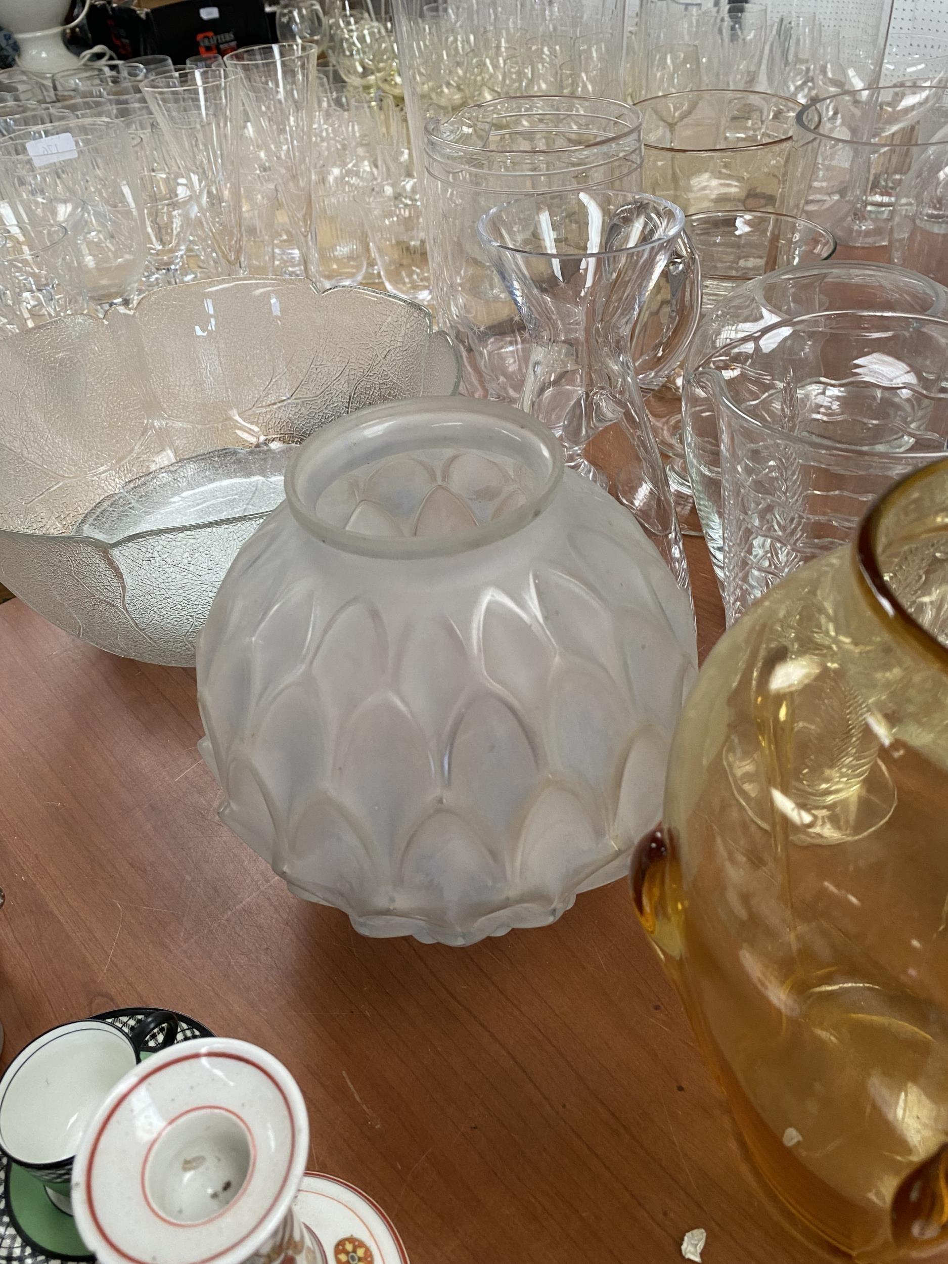 A good quantity of glass wares to include glass vases, candle sticks, glass candle holders, jugs and - Image 5 of 7