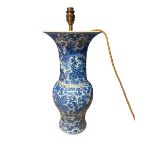 A blue and white Chinese style ceramic lamp, with brass light fitting, not drilled to base, some