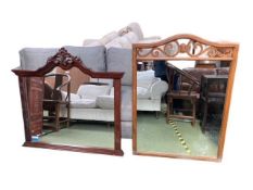 Two large wooden mirrors, the first large wooden framed wall mirror, with scrolling arched frieze to