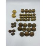 A collection of military gilt buttons