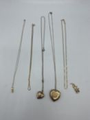 A collection of 9ct gold items to include two heart lockets(one back and front example)