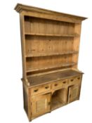 A pine kitchen dresser 143cm wide x 200cm H approx.