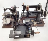 Four vintage sewing machines, Wheeler and Wilson, Singer Wilcox and Gibbs with boxes