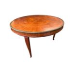 Empire segmented veneered circular low table with brass edging on cabriole legs , veneer cracking