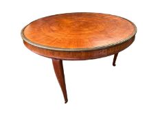 Empire segmented veneered circular low table with brass edging on cabriole legs , veneer cracking